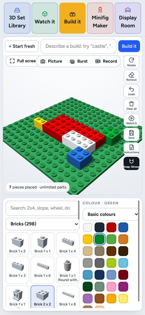 Brick Studio: Build it: Building an original model on a green baseplate with the parts palette.